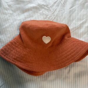 orange bucket hat with heart detail #heart #hat